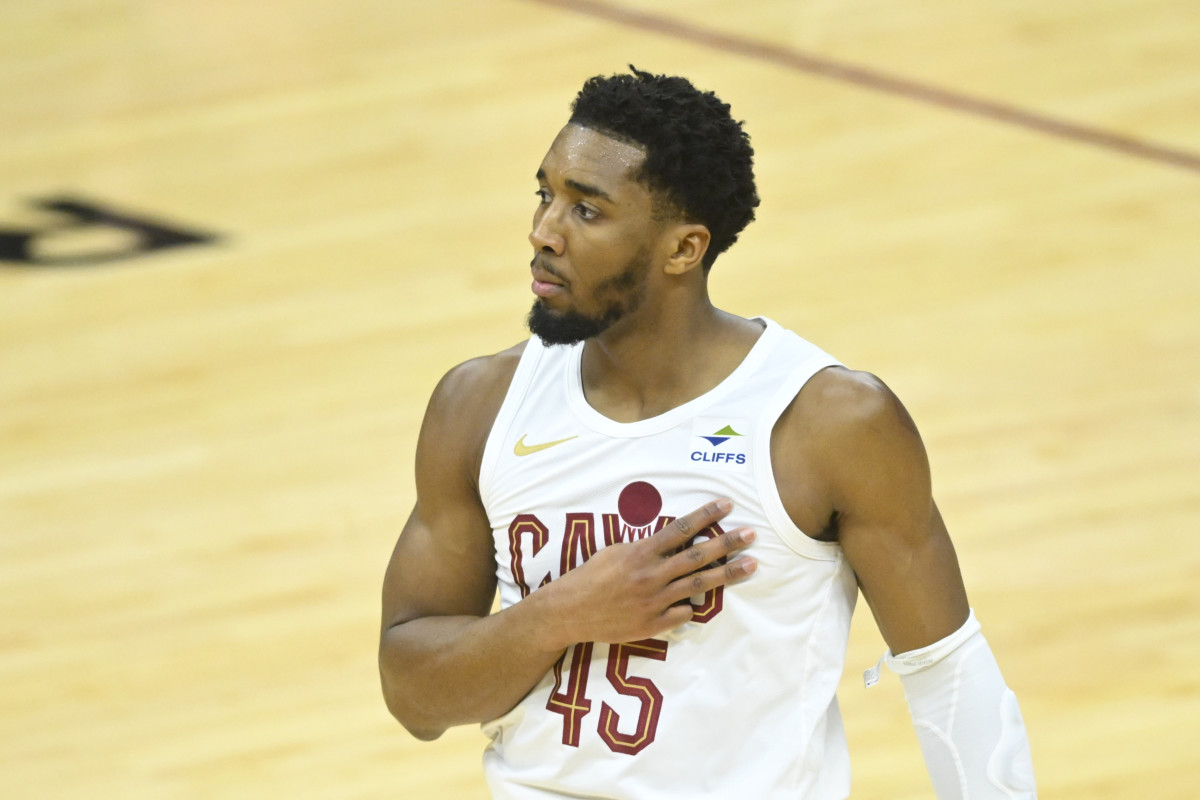 Feb 5, 2024; Cleveland, Ohio, USA; Cleveland Cavaliers guard Donovan Mitchell (45) celebrates his three-point basket in the third quarter against the Sacramento Kings at Rocket Mortgage FieldHouse.